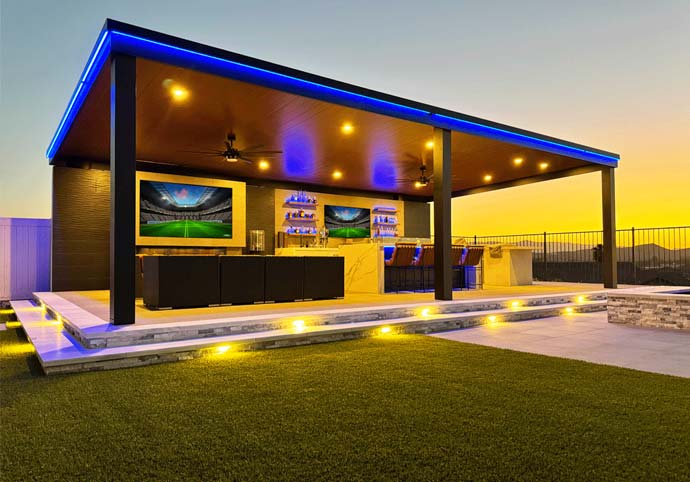WEBSITE-HOME-PAGE-THUMBNAILS-Patio-Cover-No-Text Modern covered outdoor patio with integrated lighting and bar seating