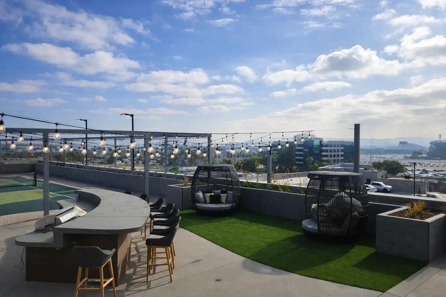 Modern rooftop outdoor living artificial turf hardscape